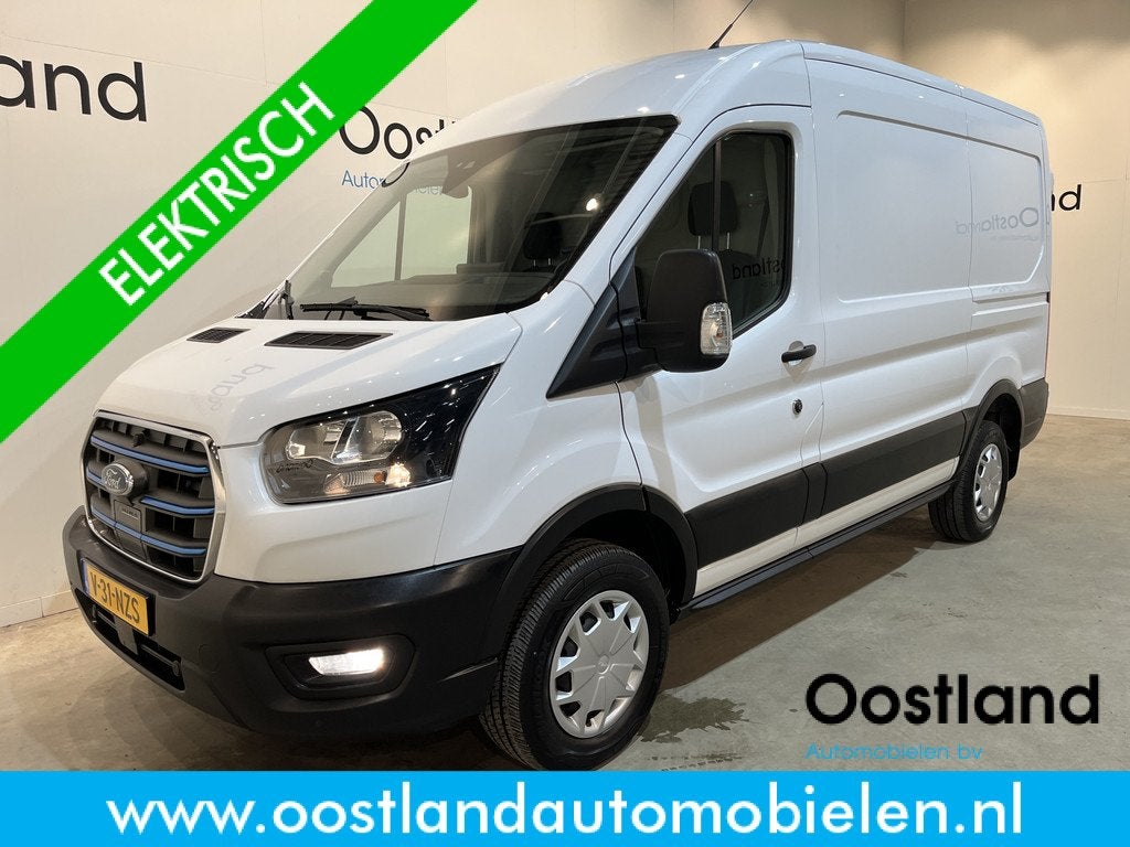 Ford E-Transit 390 (3500 kg) L2H2 Trend 68 kWh / 100% Elektr, Auto's, Bestelauto's, Automaat, Gebruikt, Zwart, Met garantie (alle)