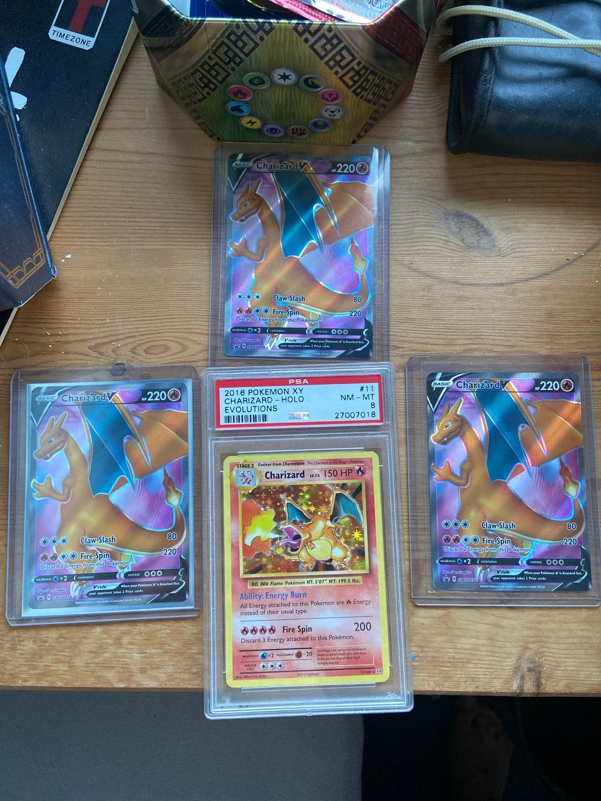 Pokémon Charizard Kaarten Collectie - PSA 8 & V-kaarten, Ophalen of Verzenden, Zo goed als nieuw, Meerdere kaarten
