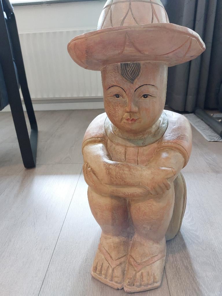 Beeld Thais houtsnijwerk, Ophalen