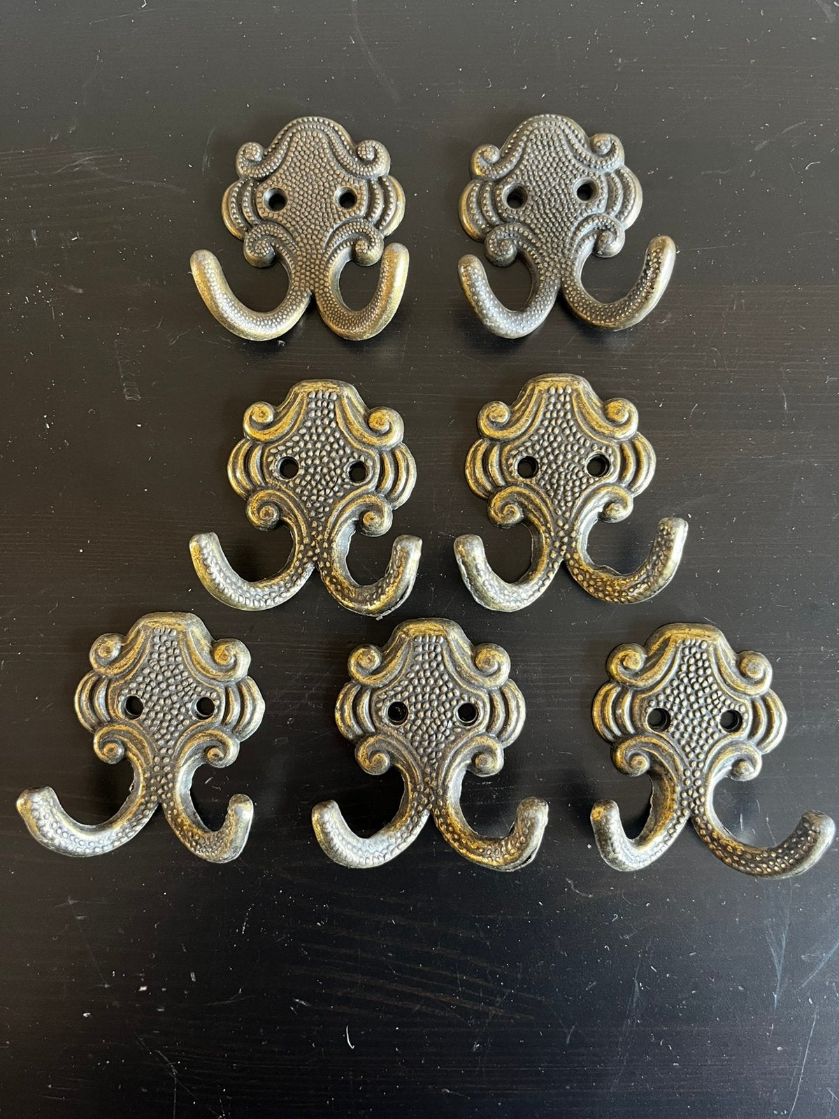 7 antieke bronzen kapstop haken, jashaken, Ophalen of Verzenden, Brons