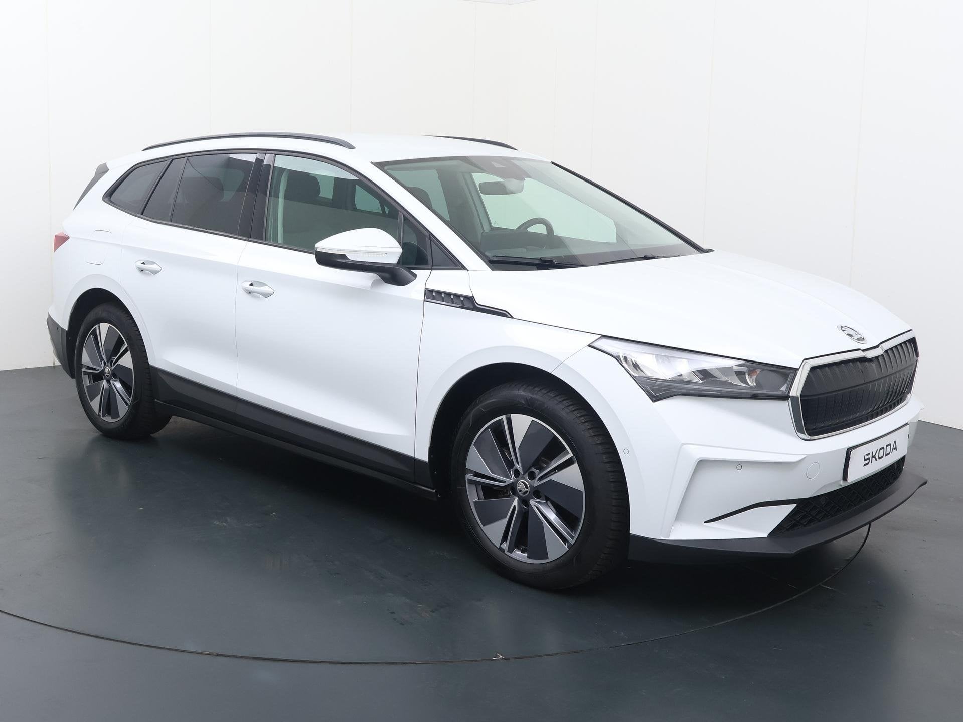Skoda Enyaq iV 60 | 180 PK | SoH 87% | Stoelverwarming | Cru, Achterwielaandrijving, Gebruikt, Leder en Stof, Wit