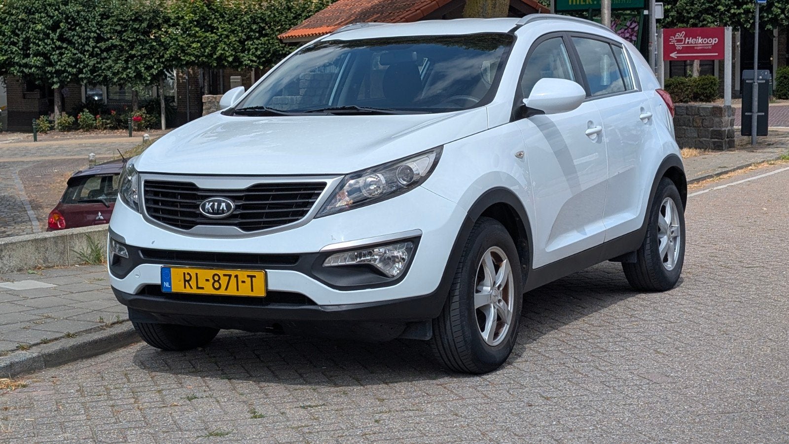 Kia Sportage 1.6, Auto's, Wit, Particulier, SUV of Terreinwagen, Onderhoudsboekje