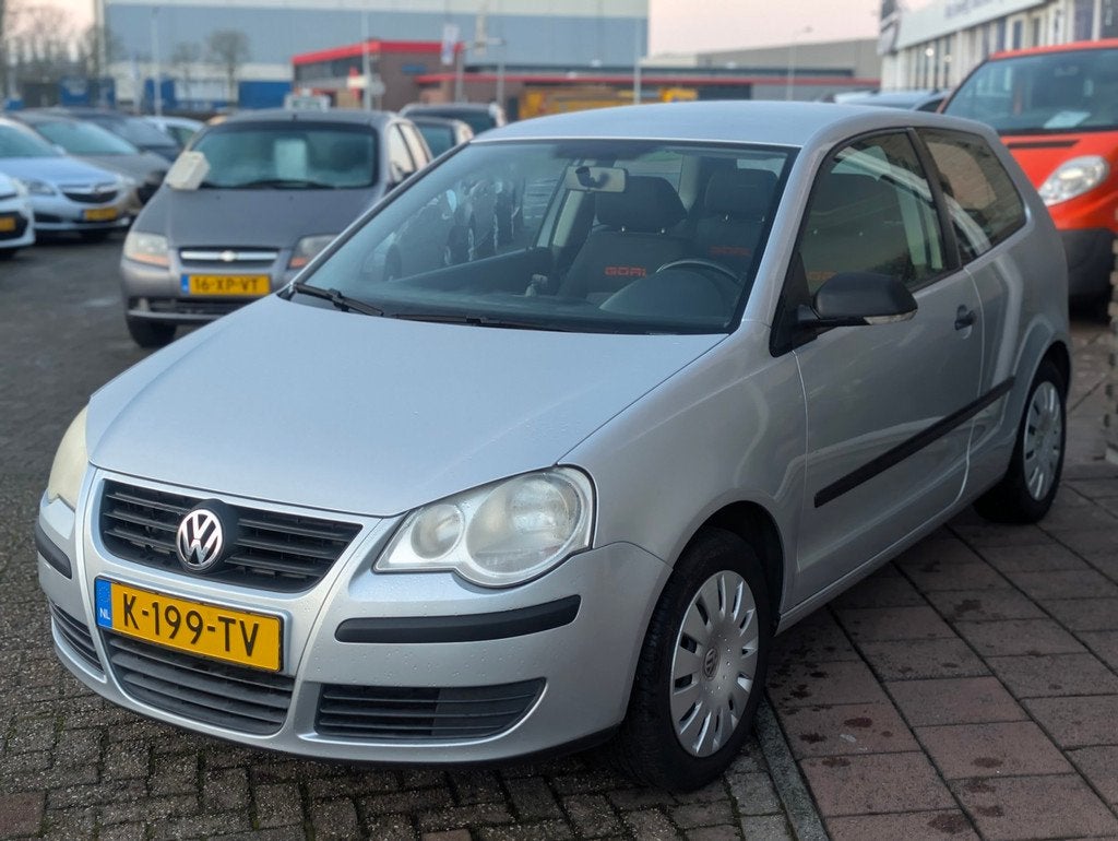 Volkswagen Polo 1.2-12V Trendline - Cruise - Airco - PDC - A, Voorwielaandrijving, Zwart, 540 kg, 1198 cc