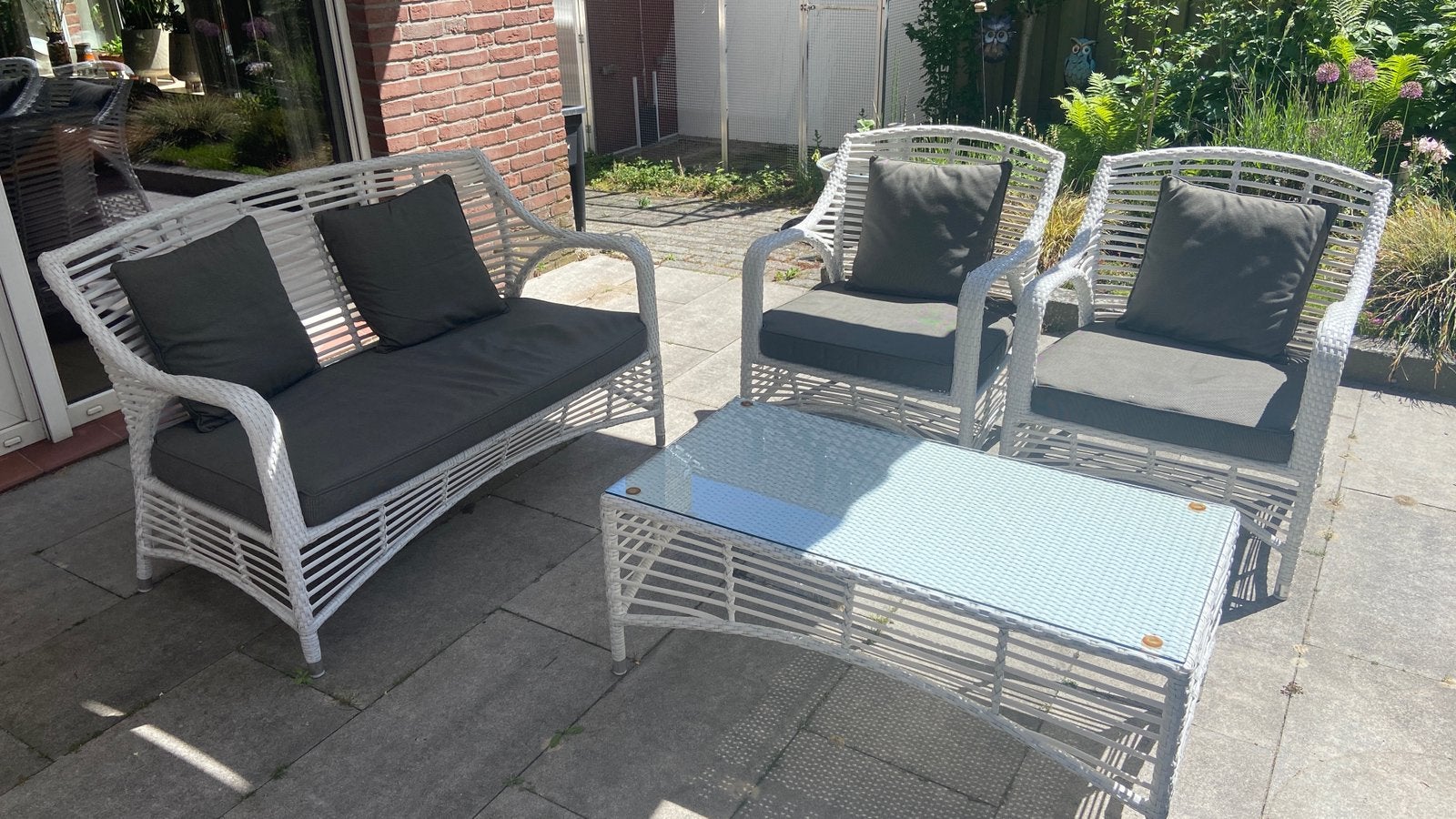 Witte kunststof lounge set. Met defect, Tuin en Terras, Ophalen, 4 zitplaatsen, Kunststof, Gebruikt