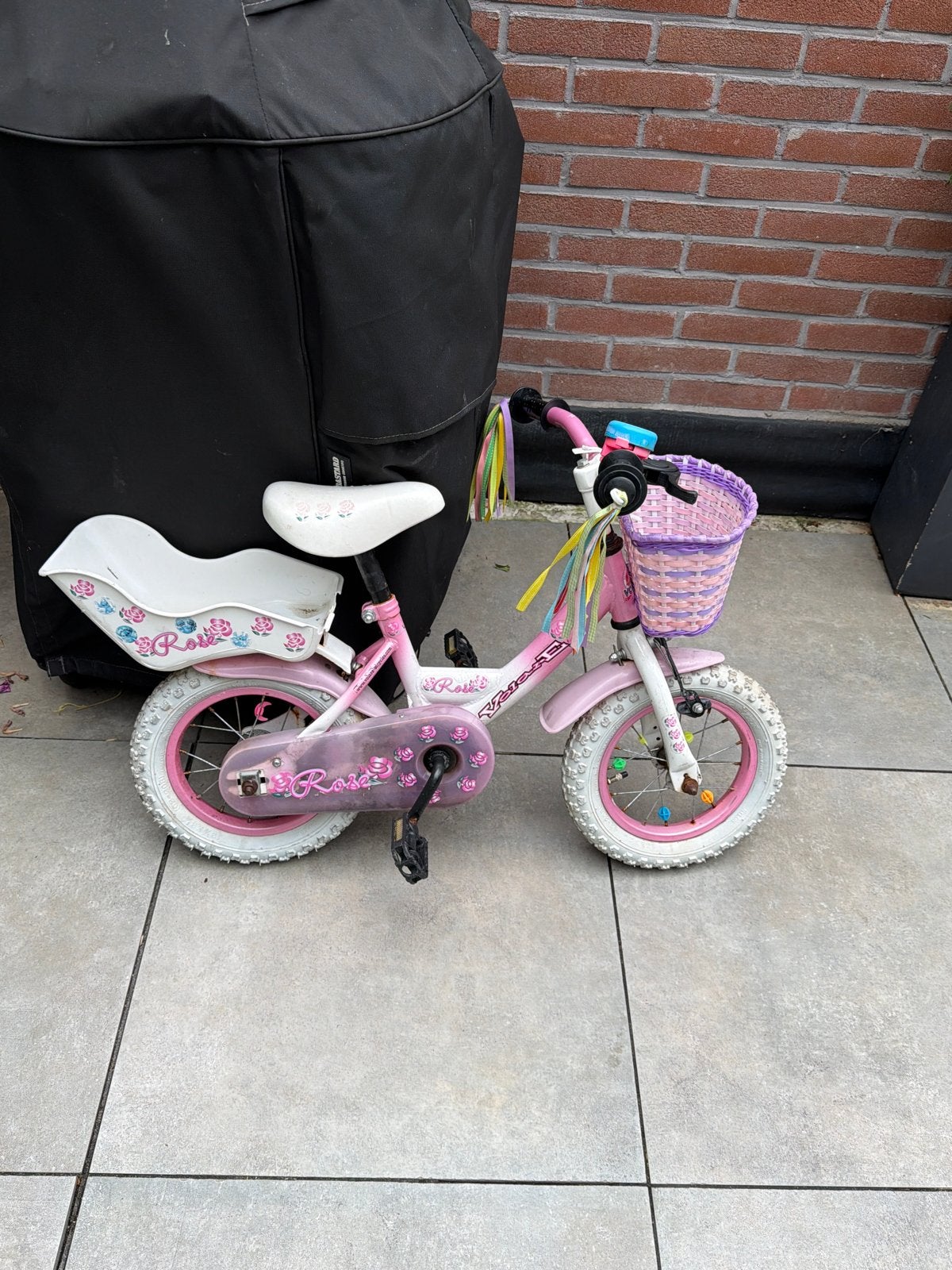 Roze kinderfiets met mandje en poppenzitje, Ophalen of Verzenden, Gebruikt, Terugtraprem, Minder dan 16 inch