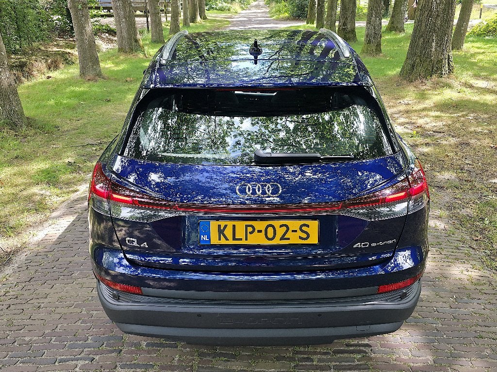 Audi Q4 40 e-tron Navarra Blue | 2023 | SOH 95% | Garantie, Auto's, Automaat, Blauw, Q4 e-tron, 204 pk