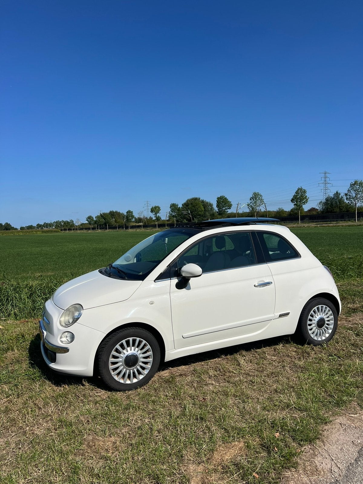 Fiat 500 1.2 69pk 2011 Wit (SCHUIFDAK, CARPLAY, NAP), 4 cilinders, 840 kg, Wit, Origineel Nederlands