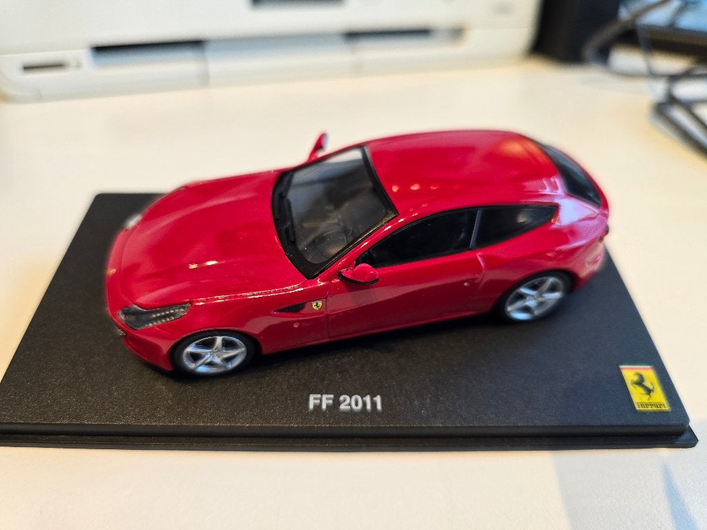 Ferrari FF 2011 1/43, Hobby en Vrije tijd, Ophalen of Verzenden, Gebruikt, Auto, Overige merken