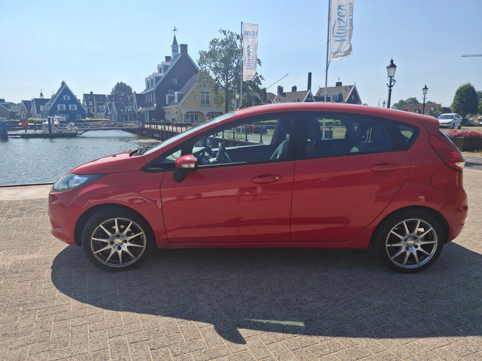 Ford Fiësta 1.25 44KW 5DR 2012 Rood Airco APK, Voorwielaandrijving, Stof, 40 €/maand, 4 cilinders