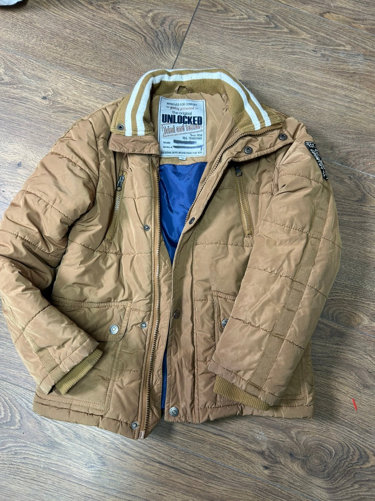 Winterjas unlocked 140-146, Ophalen of Verzenden, Gebruikt, Jongen, Jas