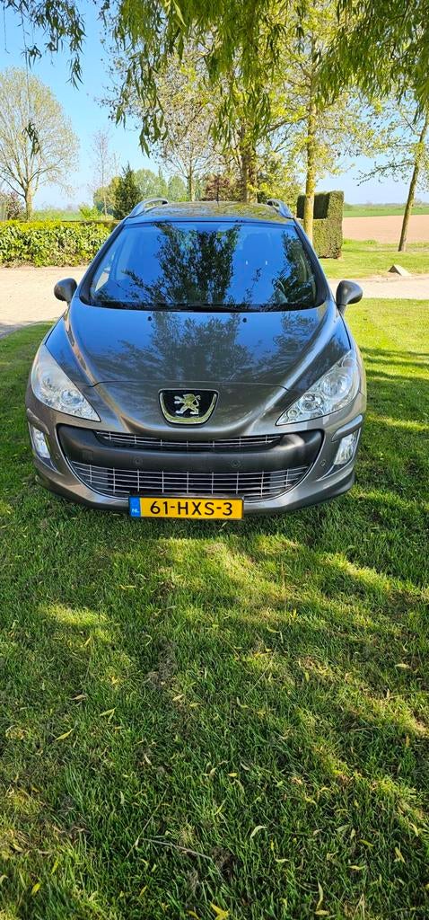 Peugeot 308 1.6 THP 103KW SW 7P AUT 2009 Grijs, Stof, 4 cilinders, 7 stoelen, Origineel Nederlands
