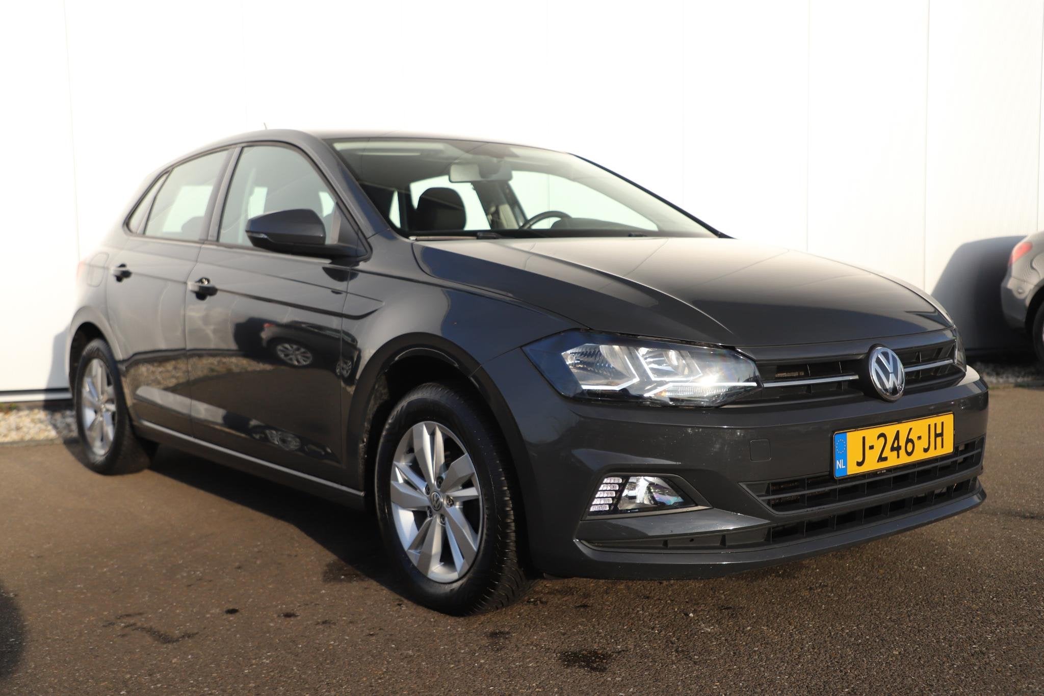 Volkswagen Polo 1.0 TSI Comfortline 95PK NAP Clima 15 inch L, Auto's, Voorwielaandrijving, Stof, Gebruikt, 95 pk