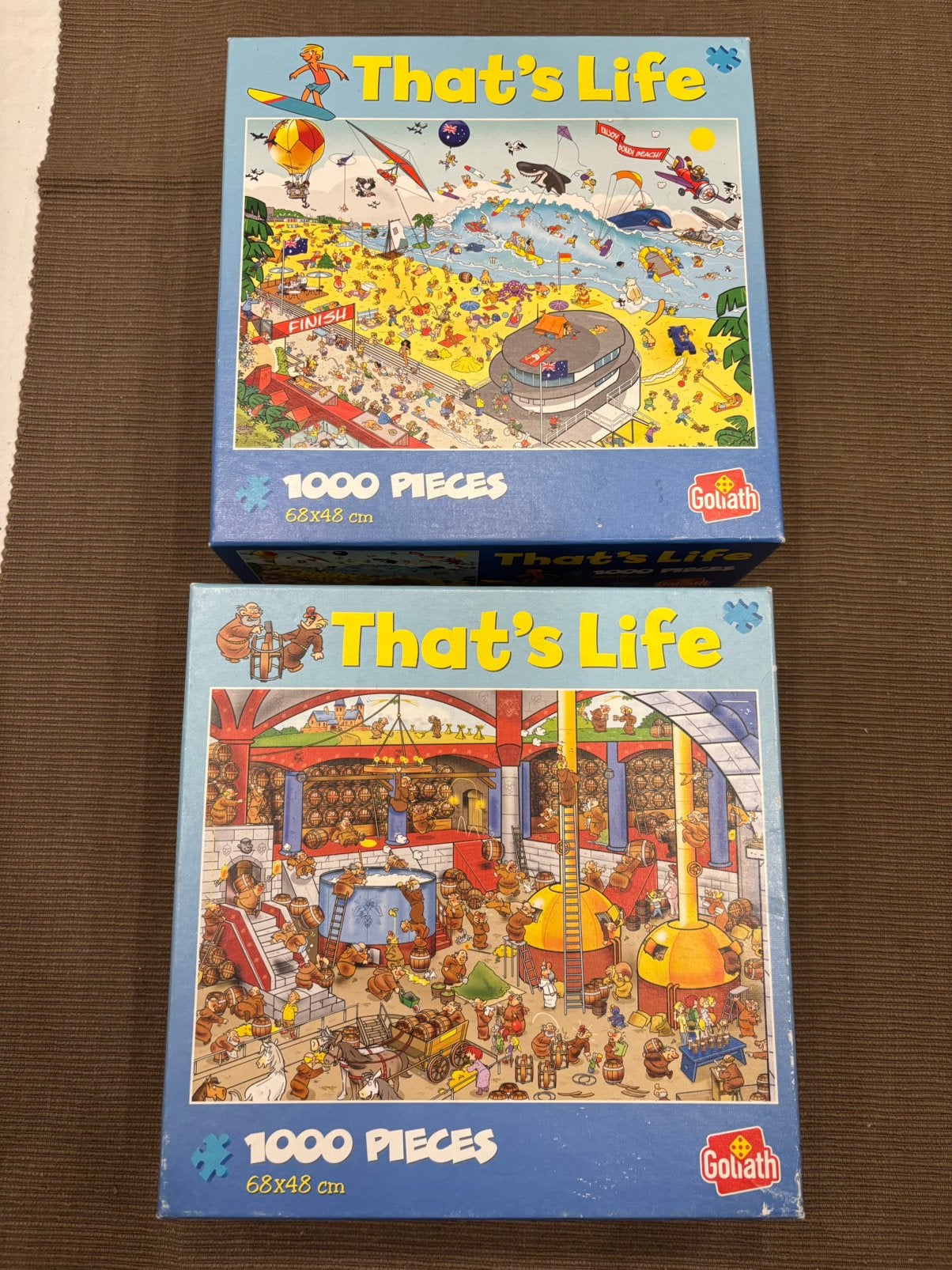 2x That's Life Goliath Puzzels 1000 Stukjes conpleet!, Ophalen of Verzenden, 500 t/m 1500 stukjes, Zo goed als nieuw, Legpuzzel