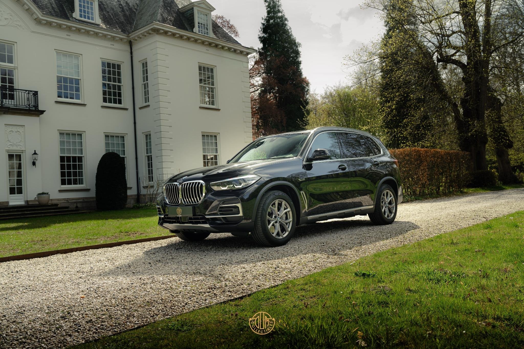 BMW X5 xDrive45e, Auto's, BMW, Stof, Gebruikt, 394 pk, Zwart