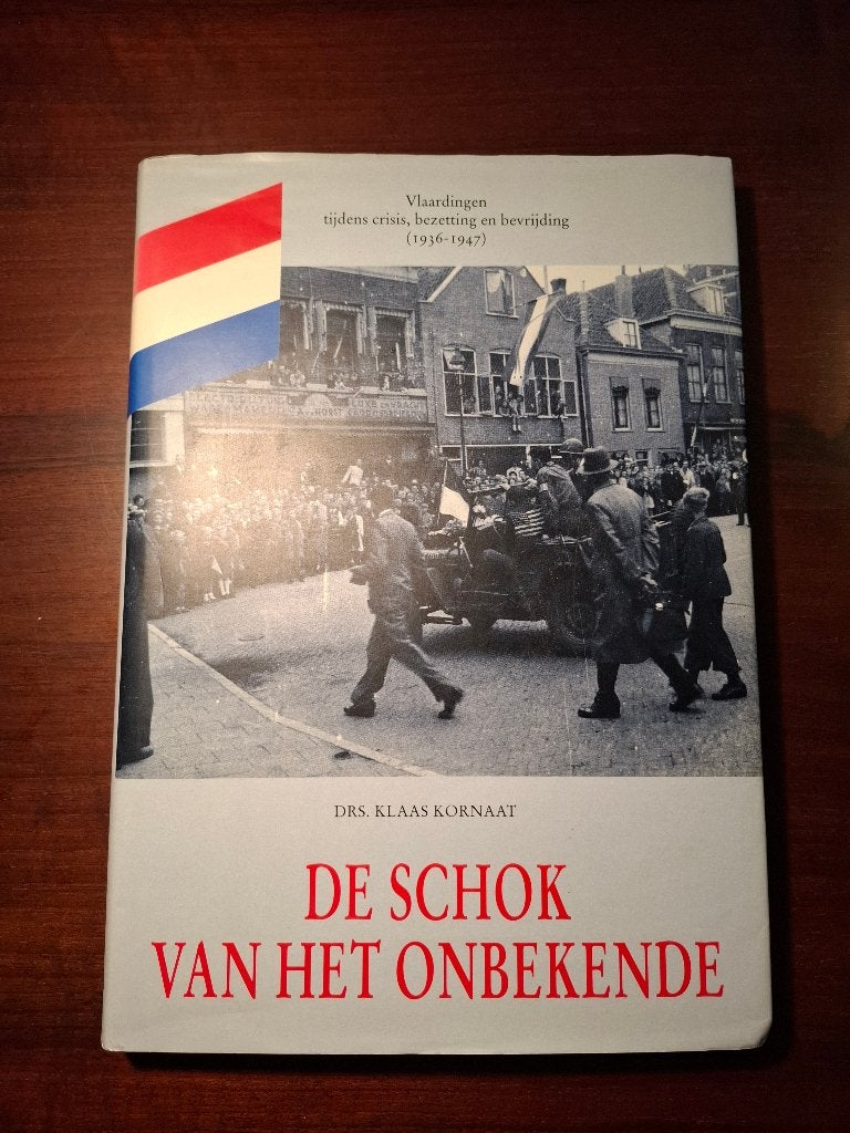 Boek - De Schok van het onbekende (Vlaardingen WO2), Boeken, Geschiedenis | Stad en Regio, Ophalen of Verzenden, K. Kornaat, 20e eeuw of later