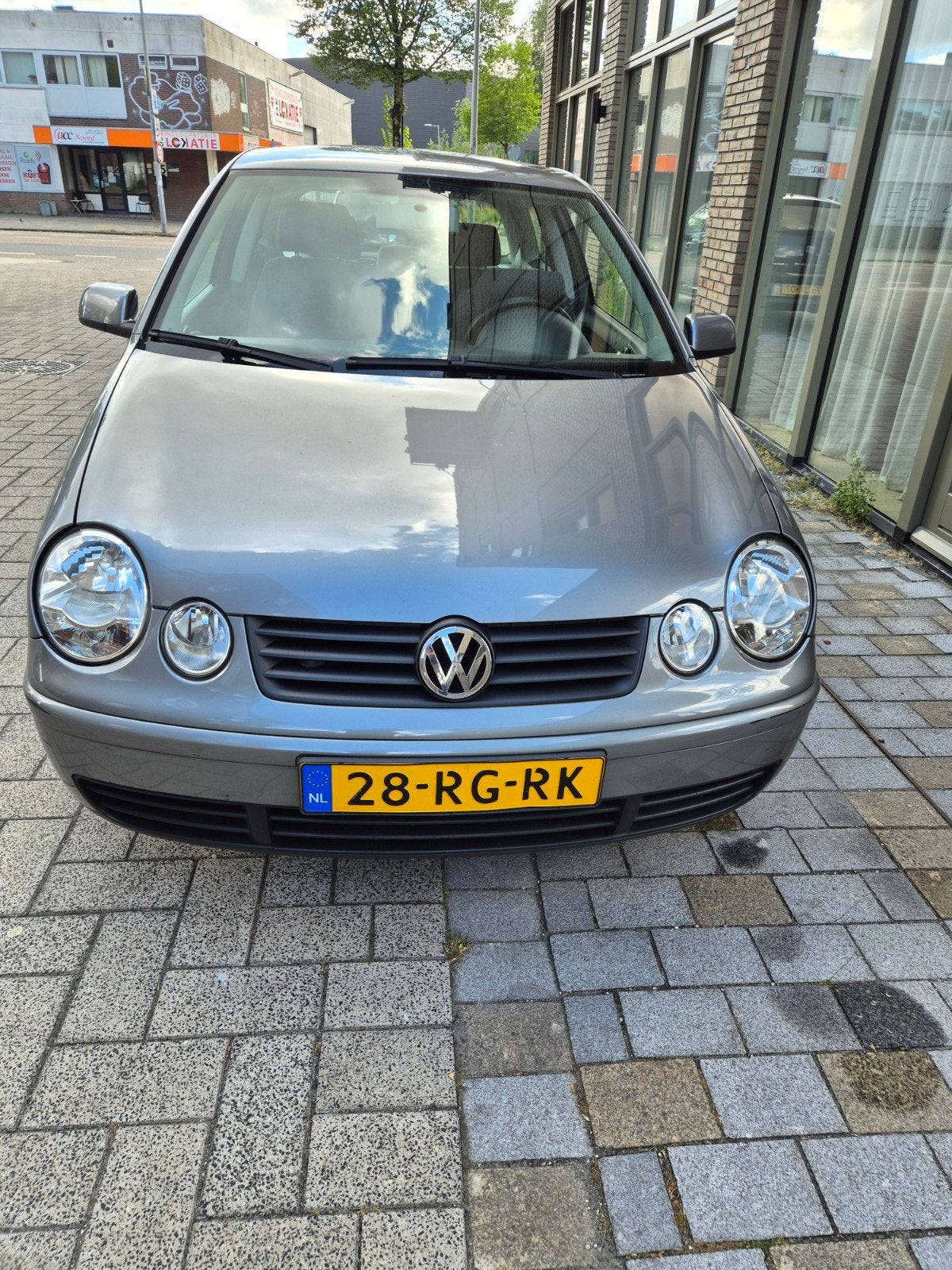 Volkswagen Polo 1.4 55KW 2005 Grijs km stand 159487 NAP, Voorwielaandrijving, 4 cilinders, Origineel Nederlands, Handgeschakeld