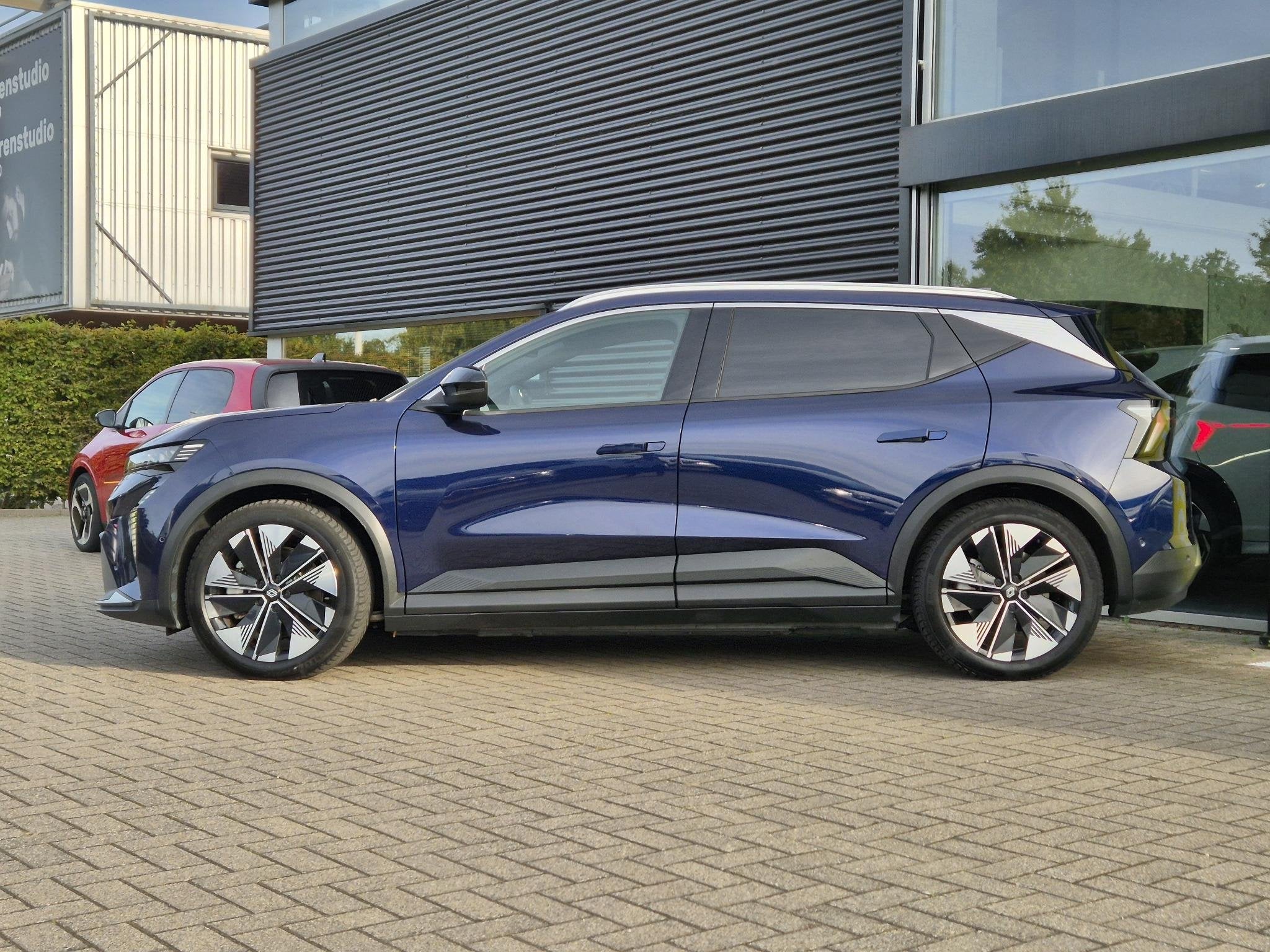 Renault Scenic E-Tech EV87 long range techno Adaptive Cruise, Auto's, Dealer onderhouden, Gebruikt, Blauw, Leder en Stof
