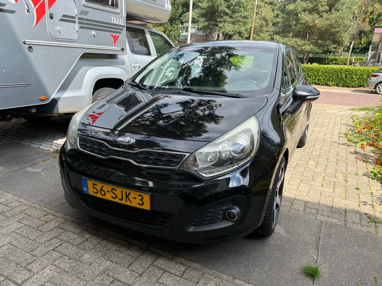 Kia Rio 1.2 I 5DRS 2011 Zwart, Auto's, Kia, Euro 5, 40 €/maand, Zwart, 4 cilinders