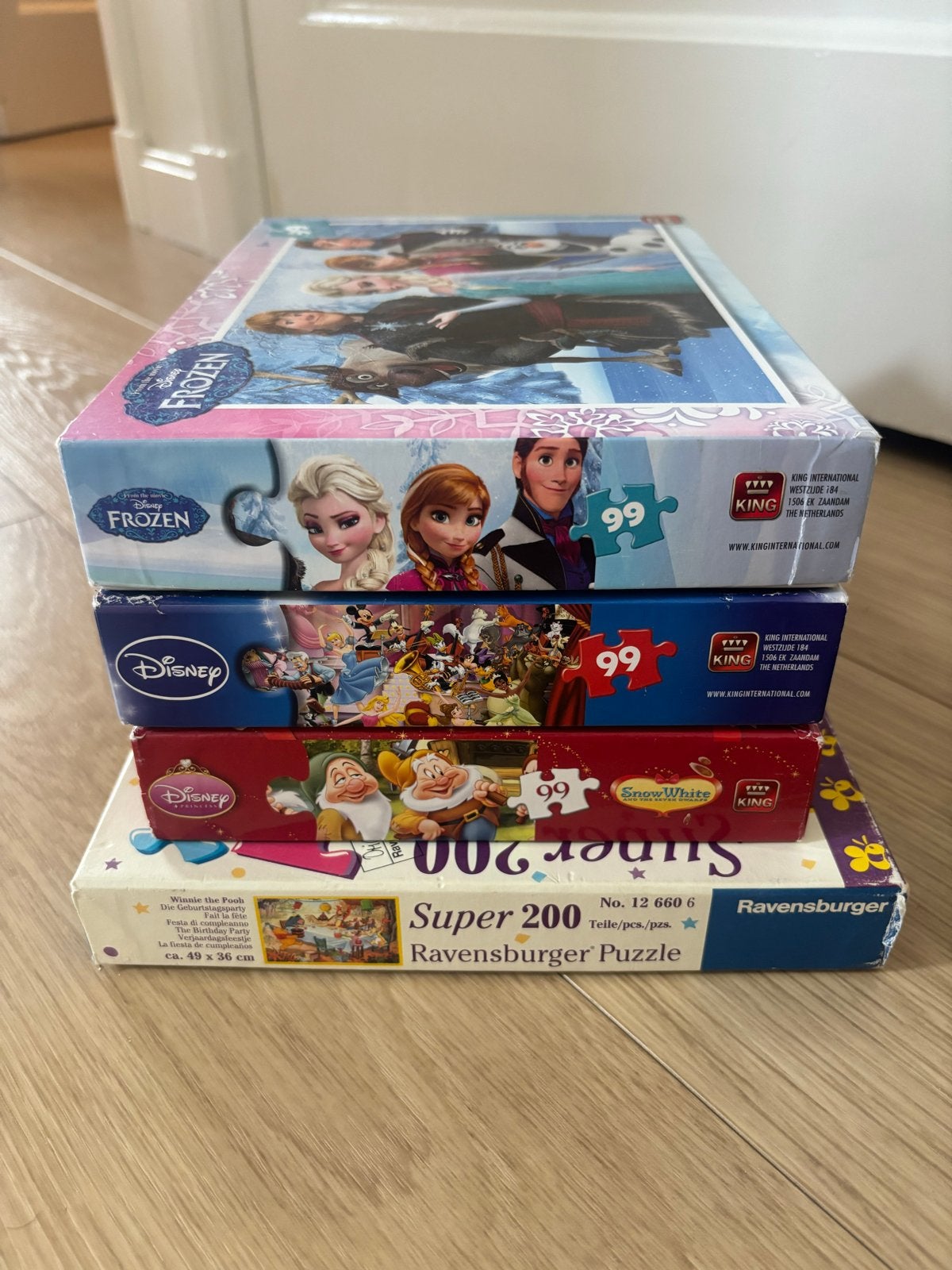 4 Disney Puzzels: Frozen, Sneeuwwitje, Disney Figuren, Pooh, Ophalen of Verzenden, Meer dan 50 stukjes, Gebruikt, 4 tot 6 jaar