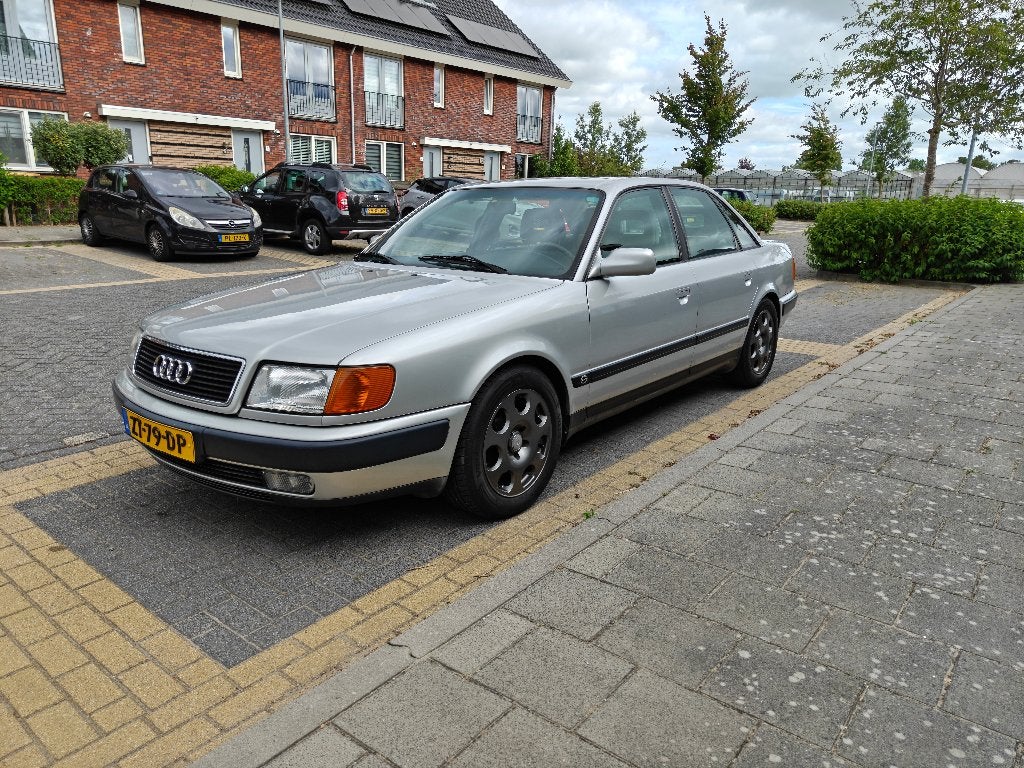 Audi 100 2.8 E AUT U9 1991 Grijs, Auto's, Audi, Particulier, ABS, Airconditioning, Boordcomputer, Centrale vergrendeling, Climate control