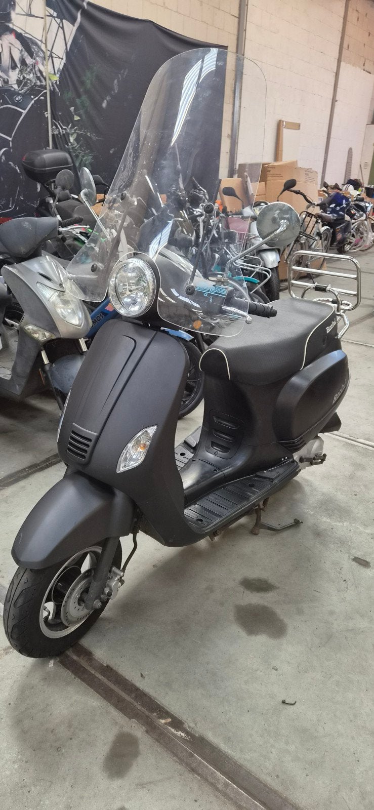 vespa look opknapper, Ophalen