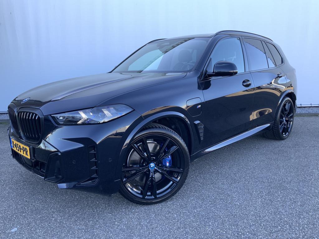 BMW X5 xDrive50e Launch Edition (bj 2023, automaat), Auto's, BMW, Gebruikt, 2395 kg, Blauw, Leder