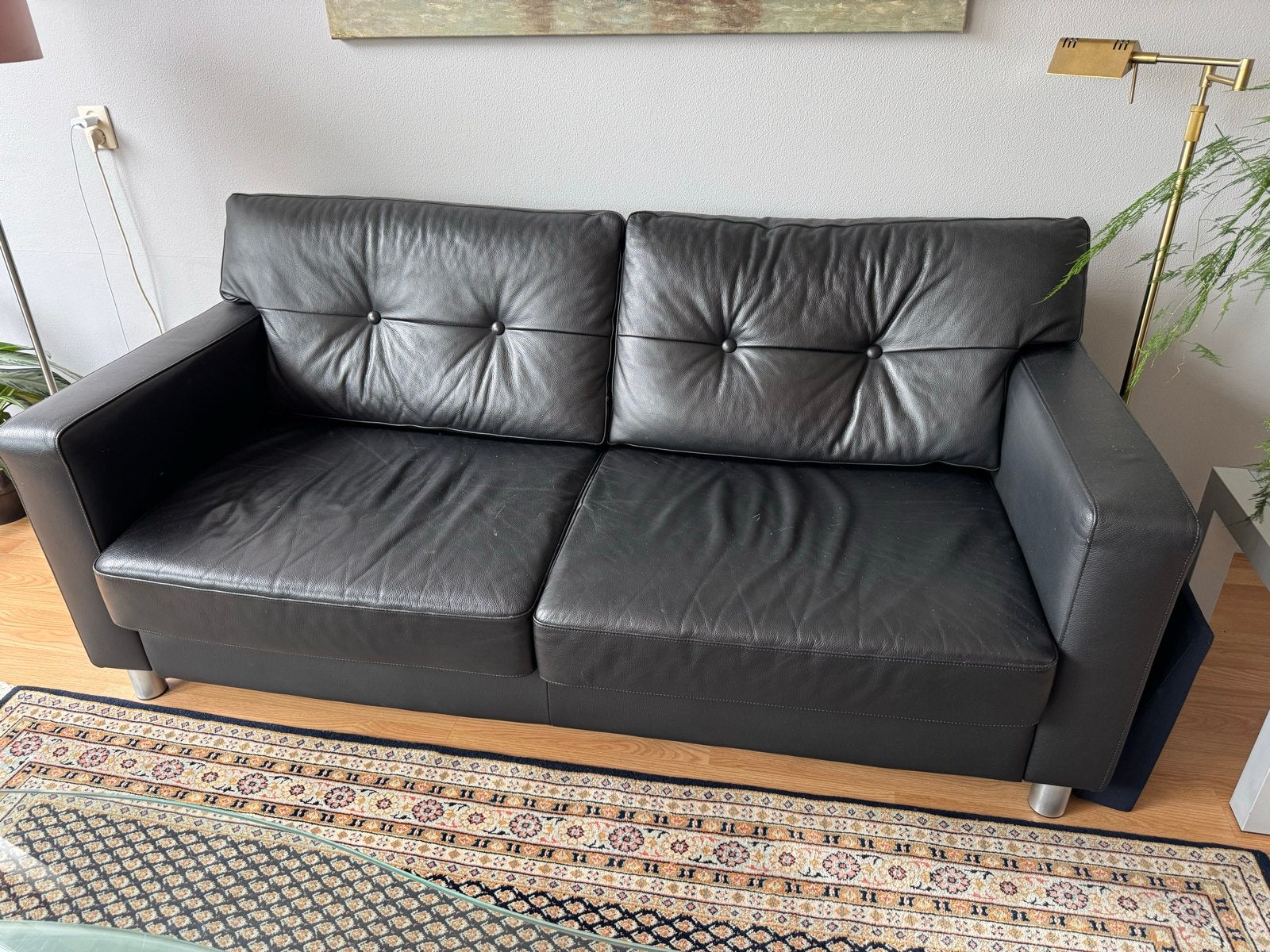 Zwarte leren tweezitsbank - Comfortabel en stijlvol, Ophalen, Gebruikt, 150 tot 200 cm, Tweepersoons