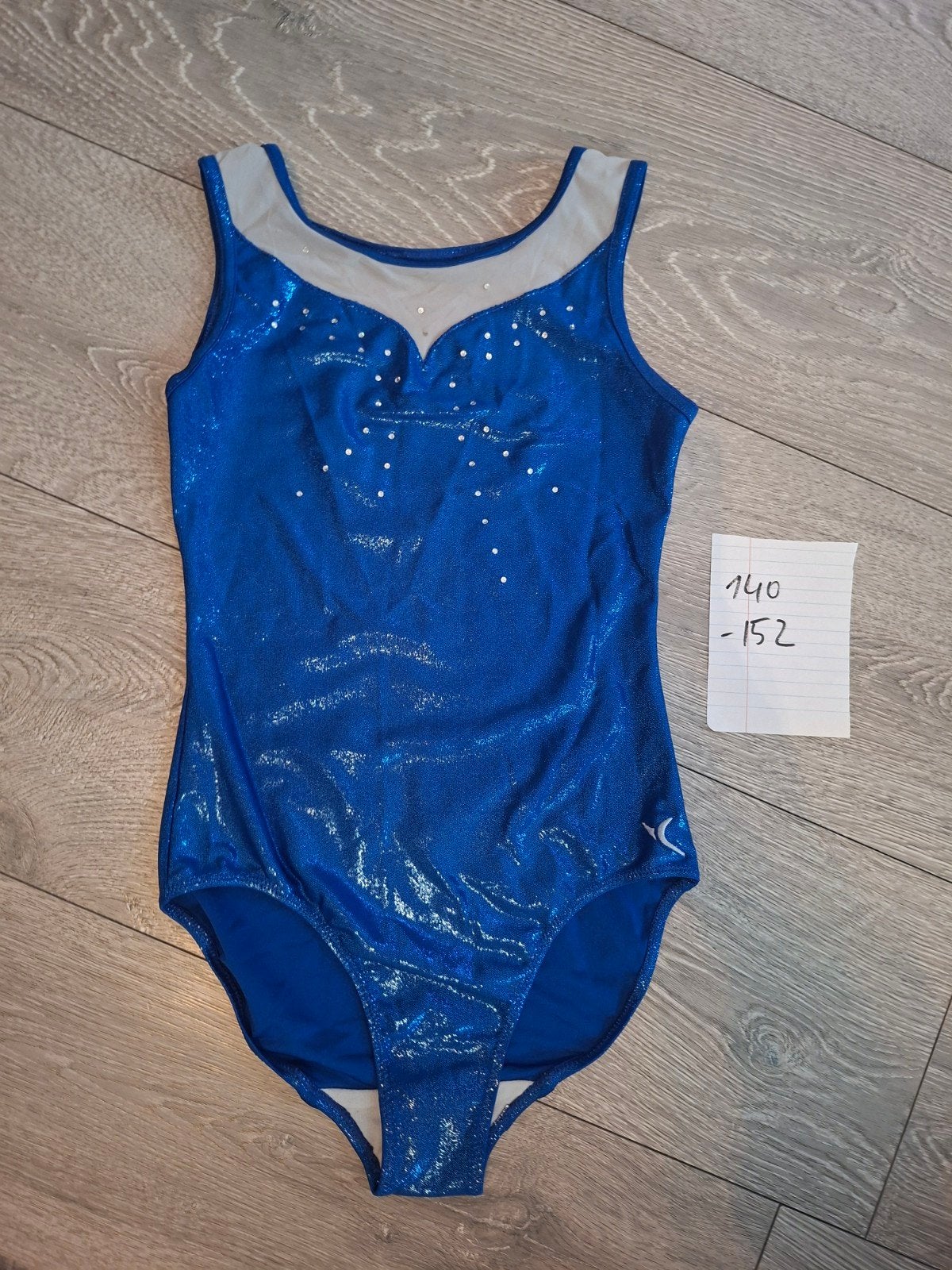 Blauw turnpakje met glitters maat 140-152, Gebruikt, Meisje, Sport- of Zwemkleding, Ophalen of Verzenden