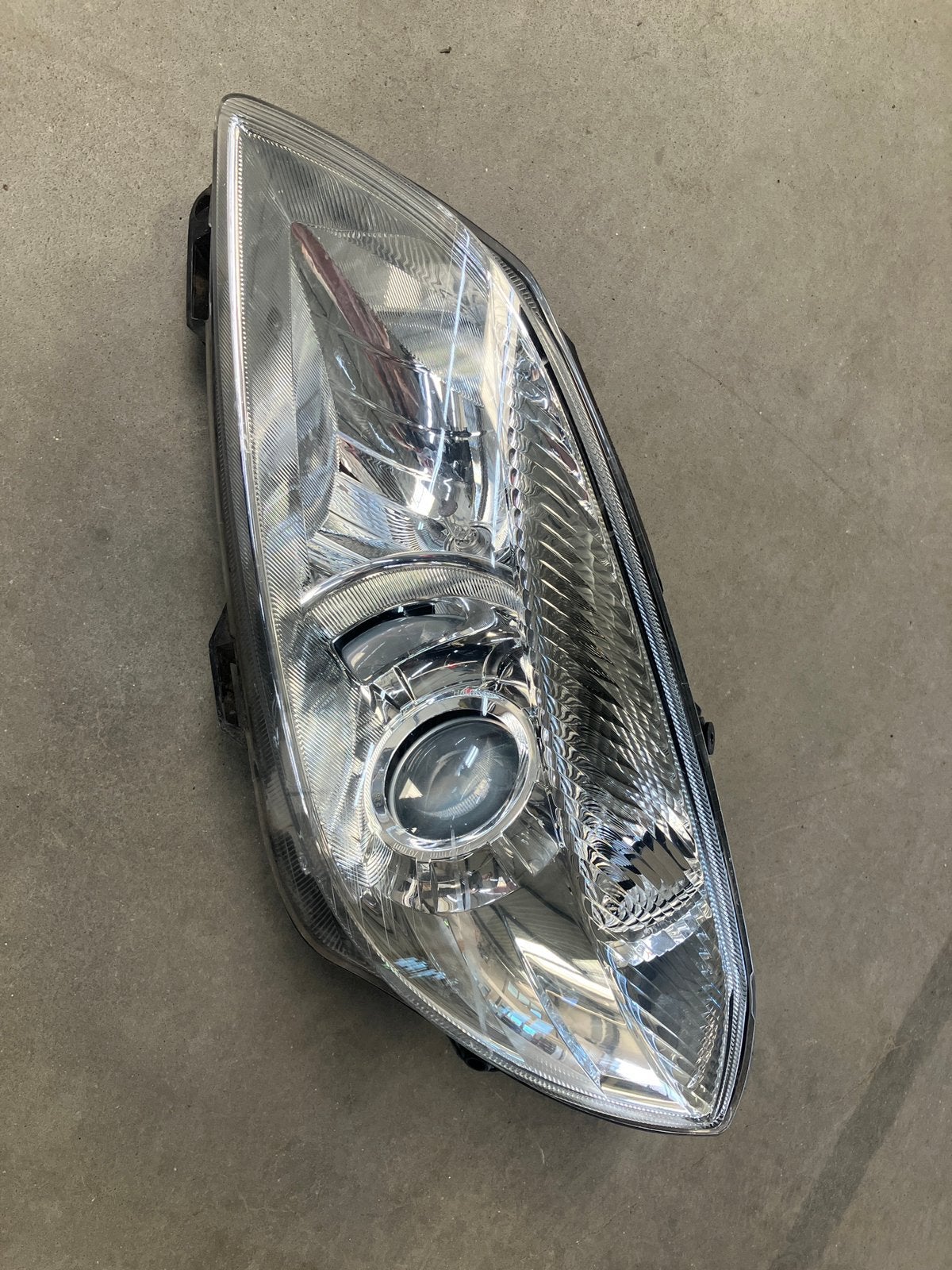 Koplamp Hella 511941015D, Ophalen