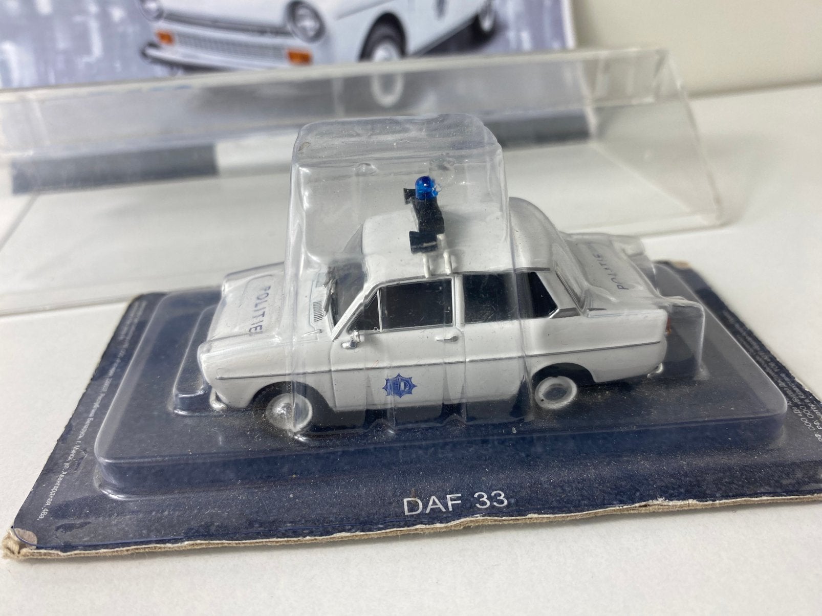 1:43 DAF 33-“politie Amsterdam 1973”-met interessant boekje, Hobby en Vrije tijd, Ophalen of Verzenden, Nieuw, Auto, Overige merken