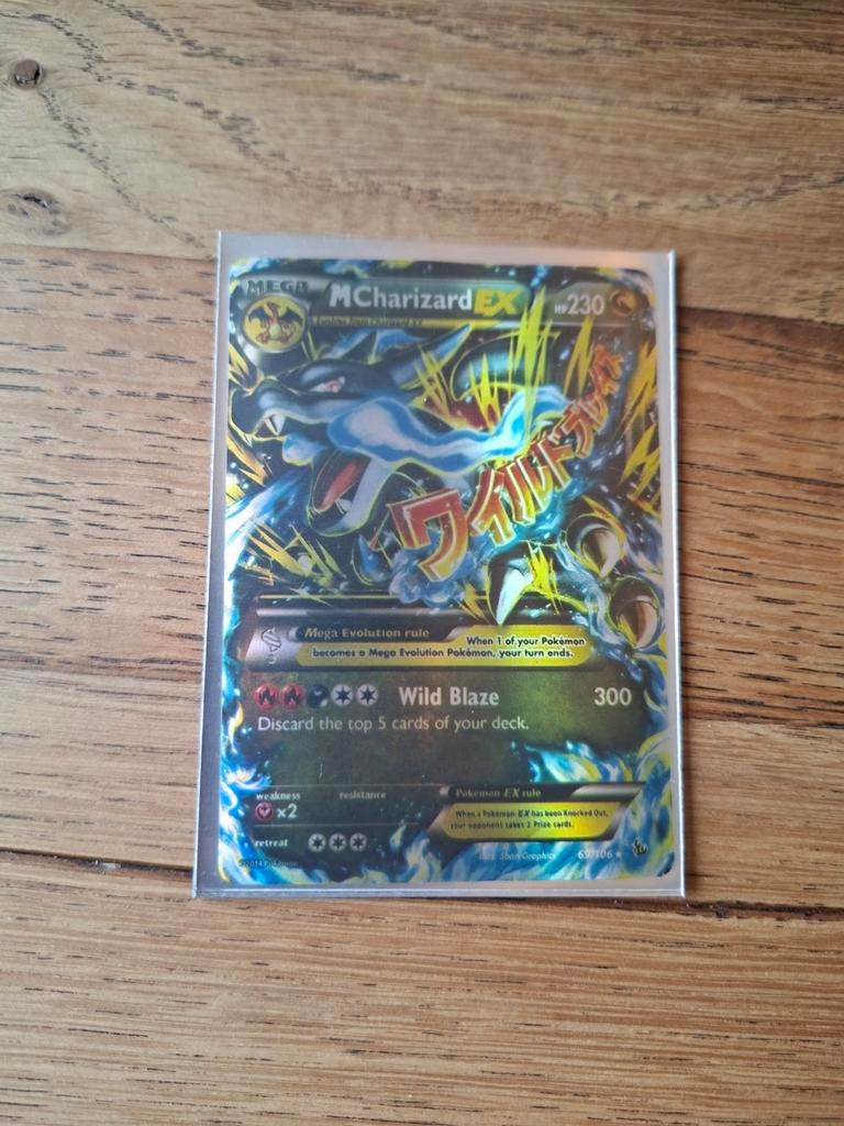 M charizard EX 69/106, Ophalen of Verzenden, Gebruikt, Losse kaart