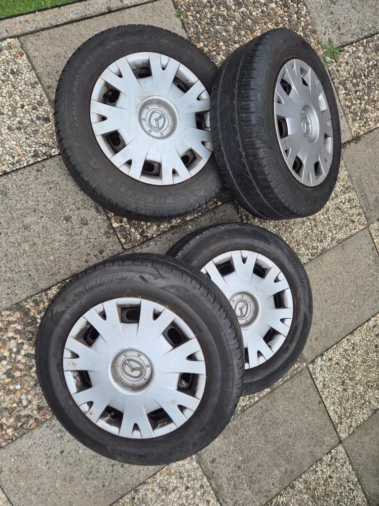 Mazda 195/65R15 91H banden met velgen en wieldoppen, Ophalen, Gebruikt