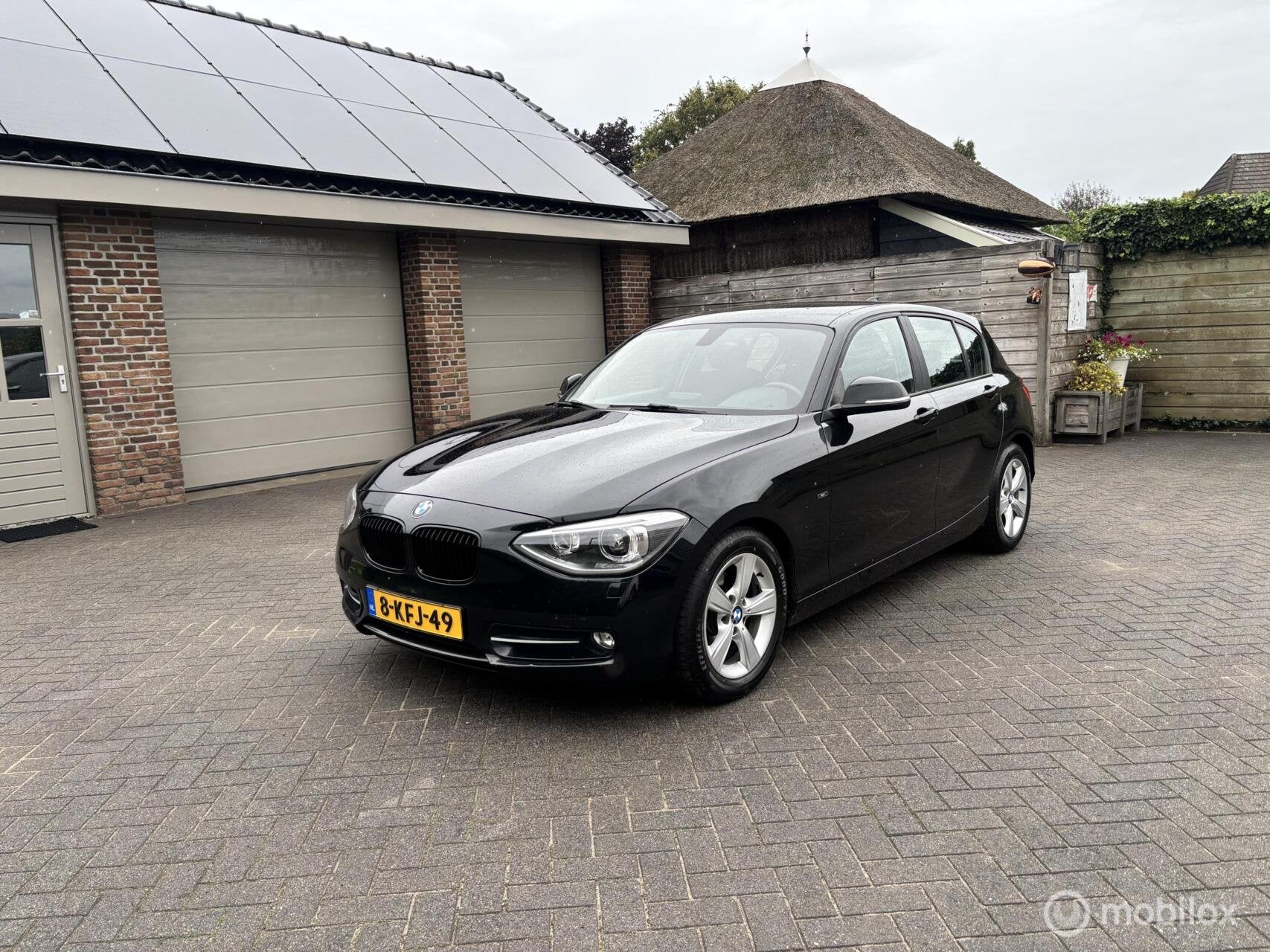 BMW 1-serie 114i Sport Executive Upgrade Xenon/Navi, Auto's, BMW, 1-Serie, Achterwielaandrijving, Gebruikt, Euro 6