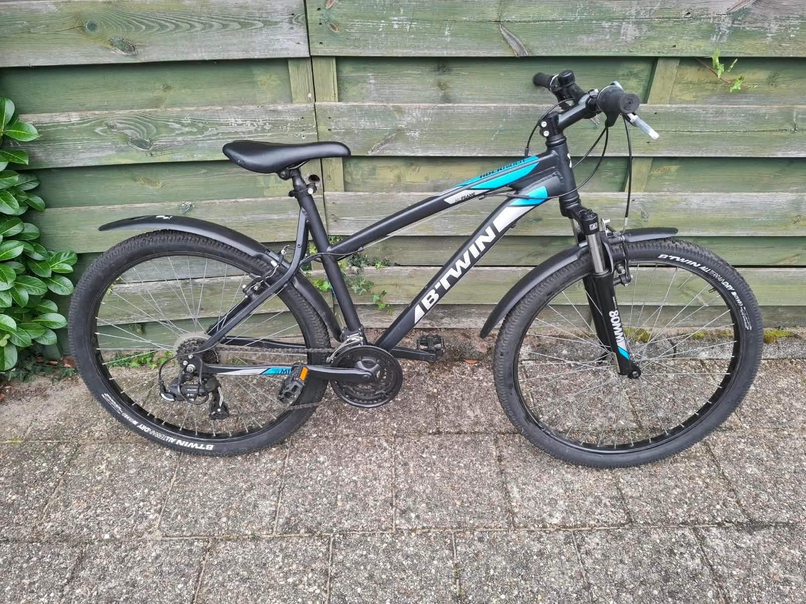 B'Twin Rockrider 340 alu 26 inch, Fietsen en Brommers, Ophalen, Gebruikt, Velgrem