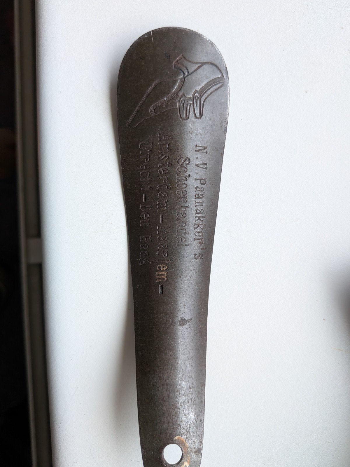 Oude metalen schoenlepel N.V. Paanakker's Schoenhandel, Ophalen