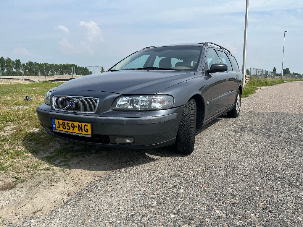 Volvo V70 2.4 140PK AUT 2004 Grijs, Auto's, Volvo, Particulier, V70, ABS, Airbags, Airconditioning, Boordcomputer, Centrale vergrendeling