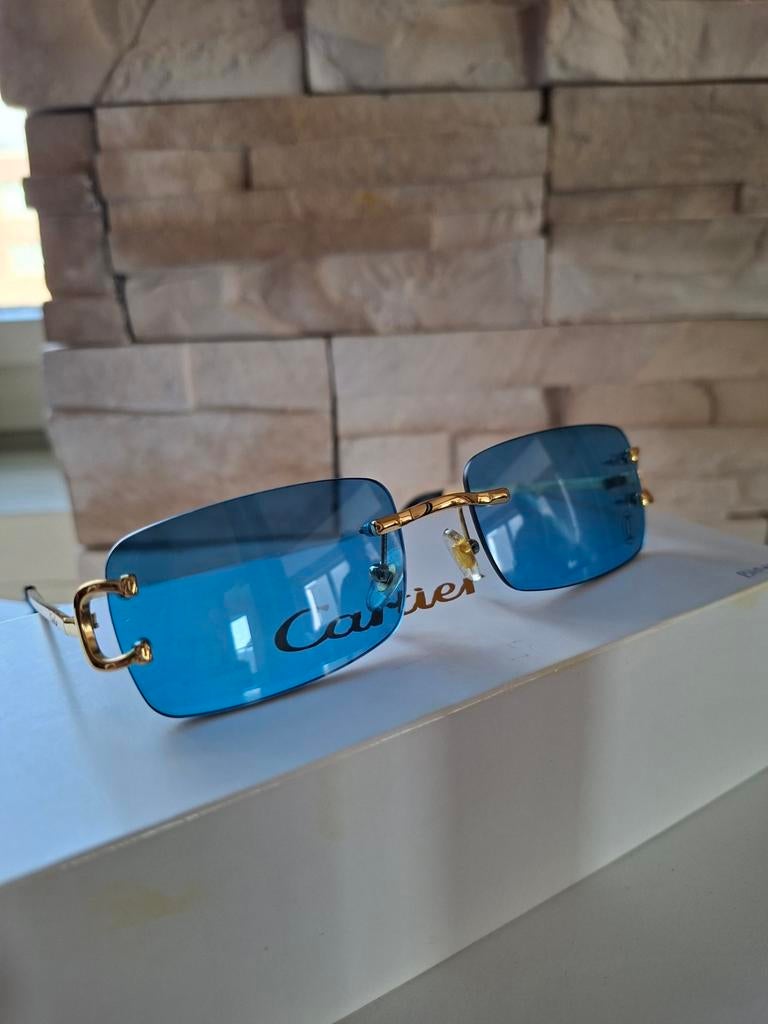 Cartier bril Blauw/goud., Sieraden, Tassen en Uiterlijk, Zonnebrillen en Brillen | Heren, Overige merken, Blauw, Nieuw, Ophalen of Verzenden