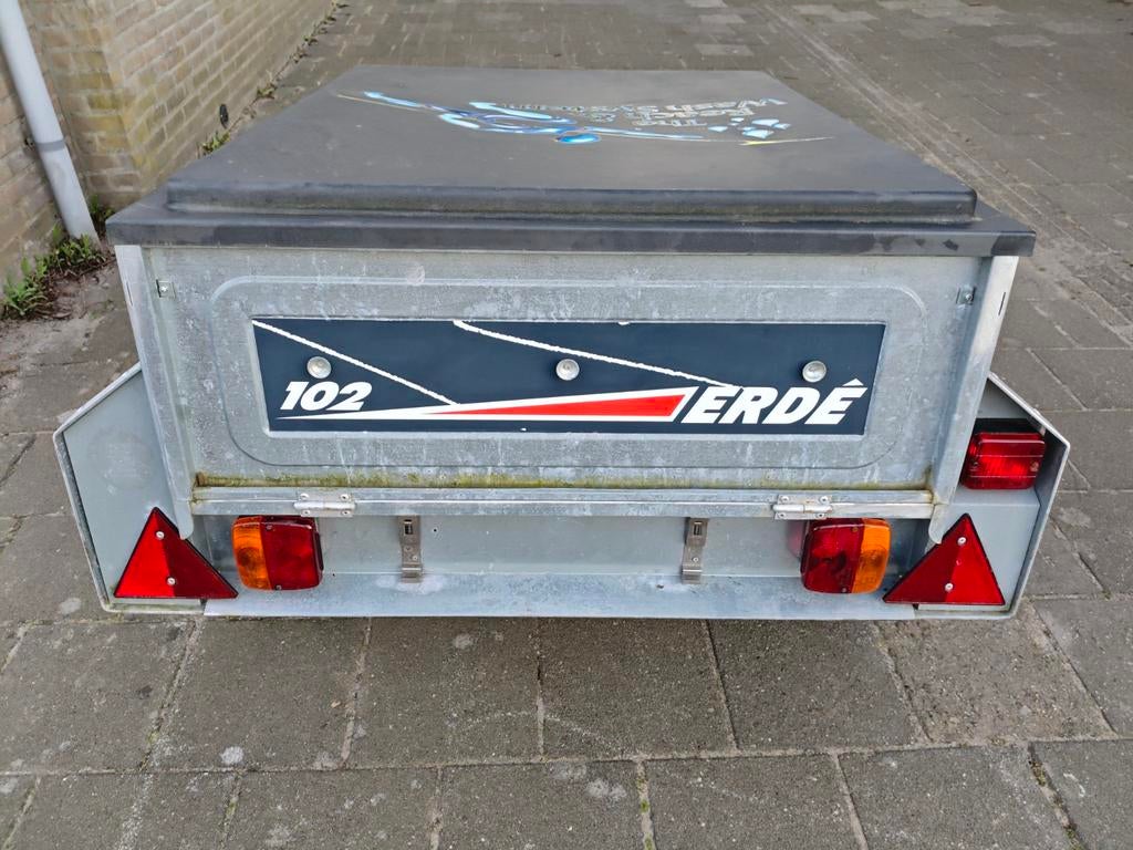 Aanhanger voor vakantie en bouwmaterialen, Ophalen