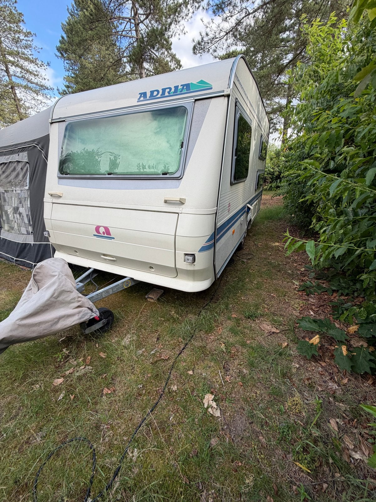 Adria Unica 391 DK uit 2001 met stapelbed en voortent, Standaardzit, Dwarsbed, 750 - 1000 kg, Particulier