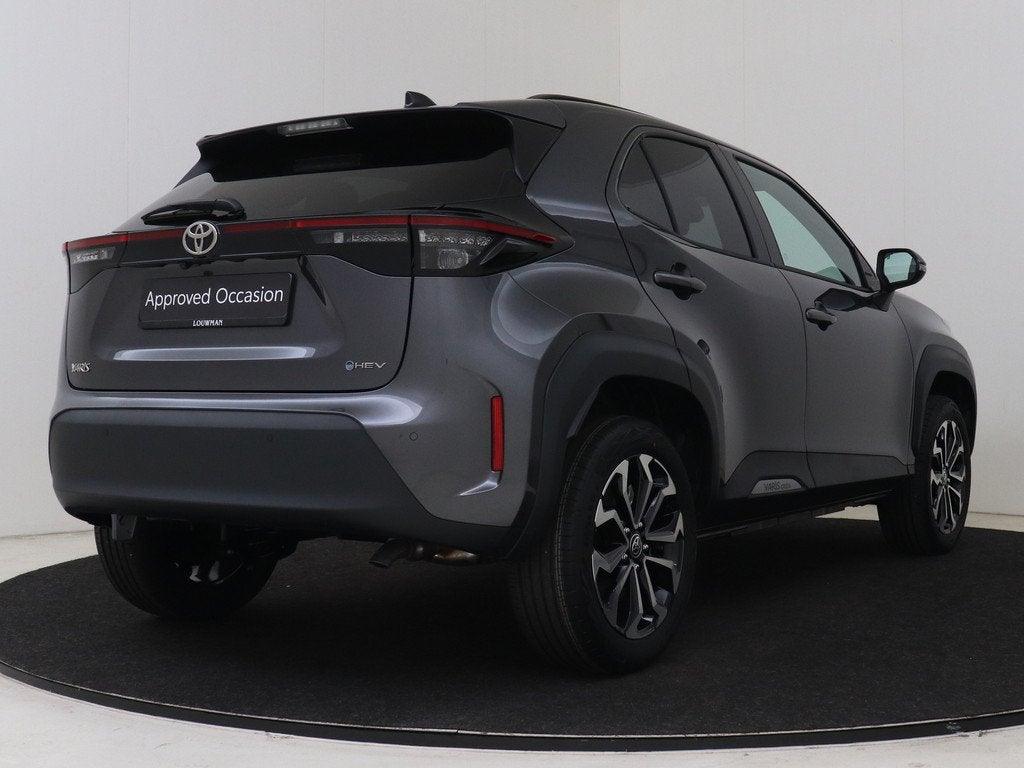 Toyota Yaris Cross 1.5 Hybrid 115 Dynamic Comfort Pack, Auto's, 12 maanden, Stof, 116 pk, Bedrijf