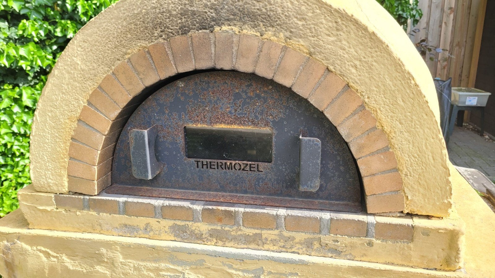 Stenen pizzaoven, Ophalen