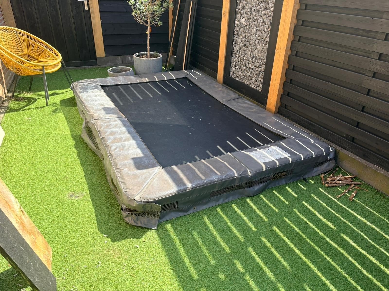 Avyna inground trampoline 275x190 +ongebruikt veiligheidsnet, Ophalen, Gebruikt