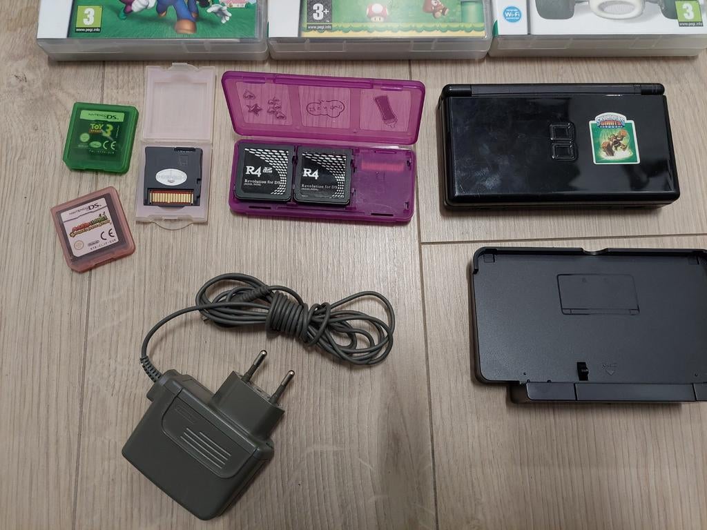 Nintendo DS Lite Zwart met 6 games en accessoires, Spelcomputers en Games, Spelcomputers | Nintendo DS, Gebruikt, Zwart, Ophalen of Verzenden