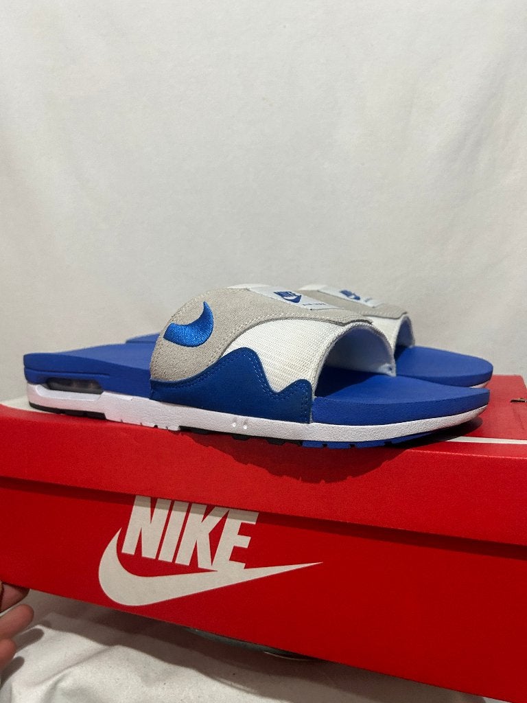 ALS NIEUW + DOOS Maat 49,5 - Nike Air Max 1 Slide Royal Blue, Slippers, Nike, Zo goed als nieuw, Nike
