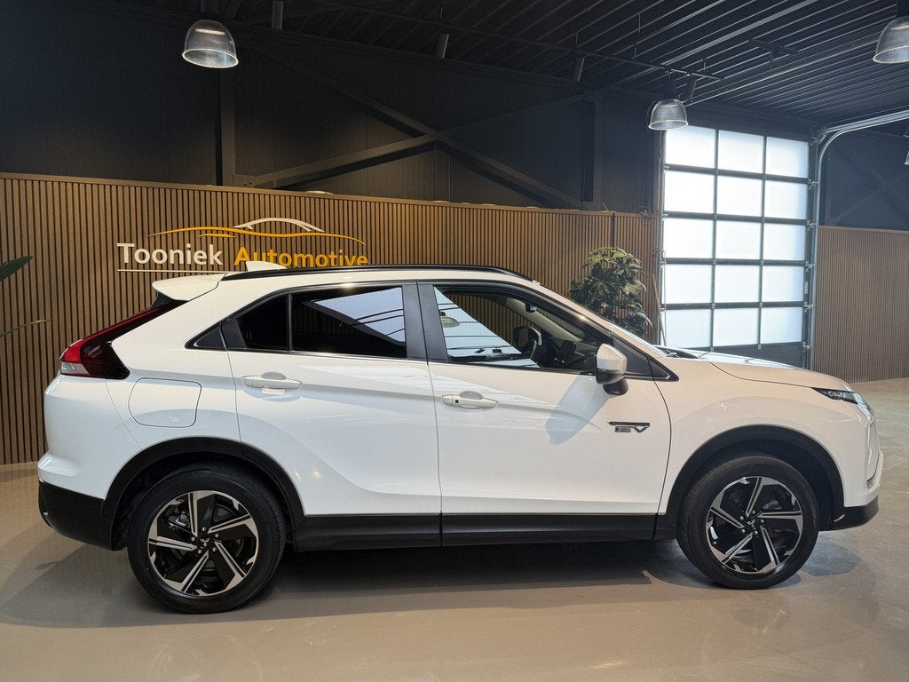 Mitsubishi Eclipse Cross 2.4 PHEV Instyle Adaptive Cruise co, Auto's, Mitsubishi, Automaat, 4 cilinders, Met garantie (alle), Wit