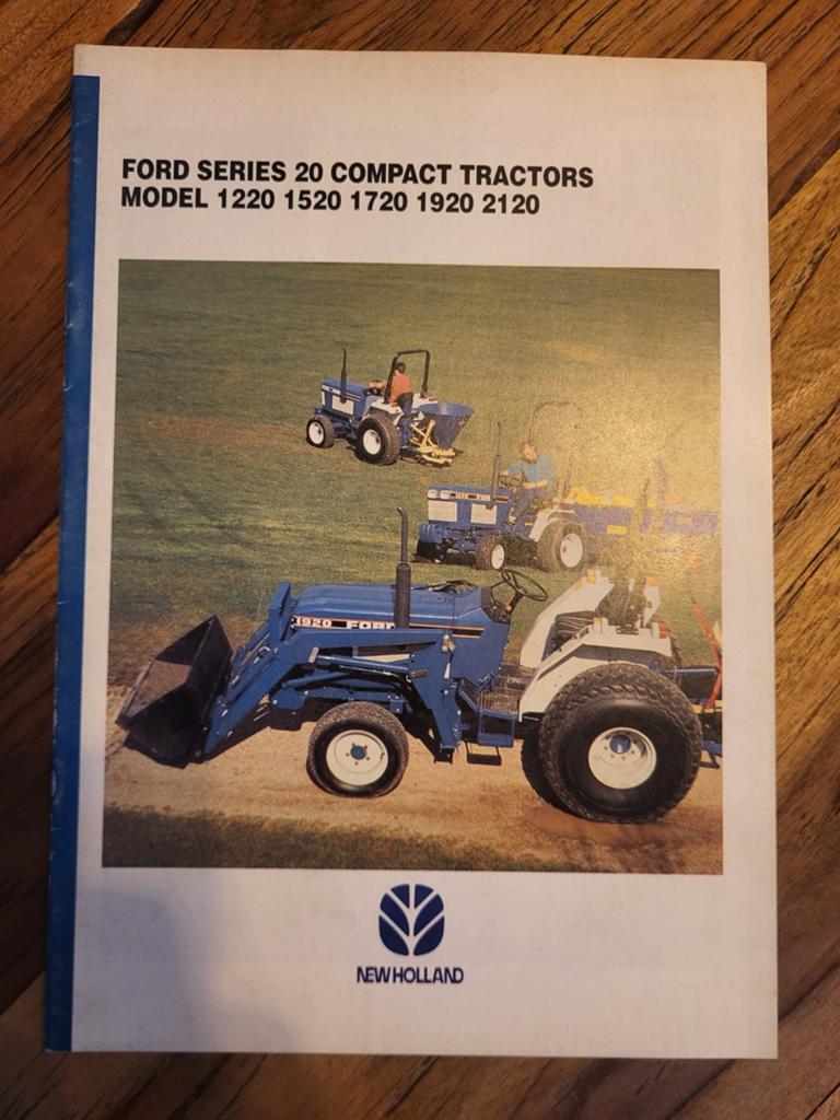 tractor folder New Holland Ford series 20, Ophalen of Verzenden, Zo goed als nieuw