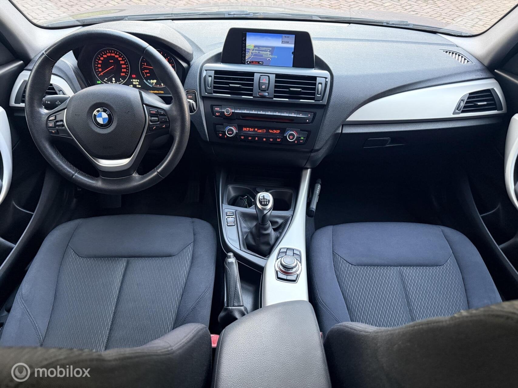 BMW 1-serie 116i EDE Executive |Navi|Clima|Cruise|Xenon|Led, Auto's, Gebruikt, Euro 6, 4 cilinders, Blauw