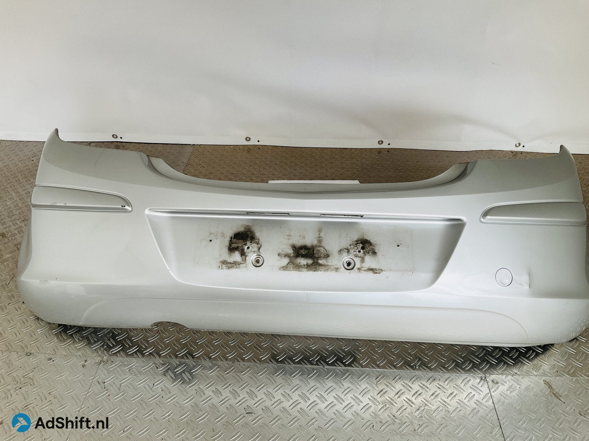 Bumper Opel Corsa D 332550271 Achterbumper 1-E10-13162, Auto-onderdelen, Carrosserie en Plaatwerk, Bumper