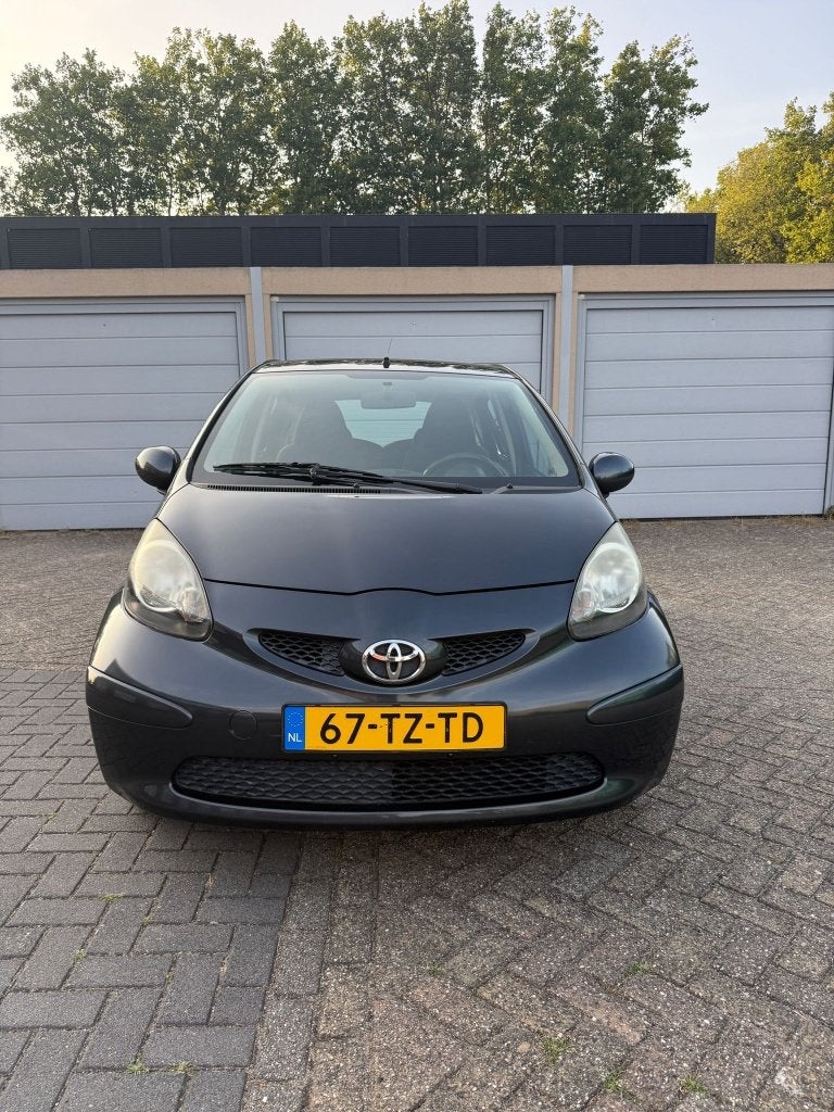 Toyota Aygo 1.0 12V Vvt-i 5DRS 2007 Grijs, Auto's, Voorwielaandrijving, 4 stoelen, 68 pk, Origineel Nederlands
