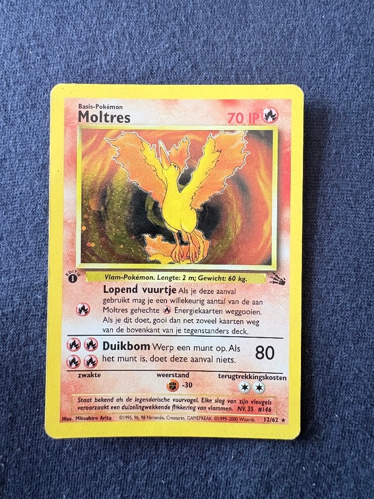 Moltres 1st Edition Holo - Fossil 12/62 - Near Mint, Hobby en Vrije tijd, Verzamelkaartspellen | Pokémon, Ophalen of Verzenden